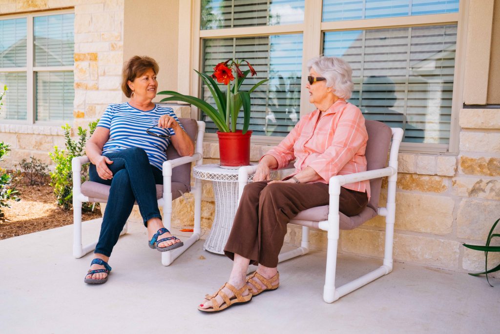 Two elderly women were talking in the spacious Emerald cottage at Round Rock